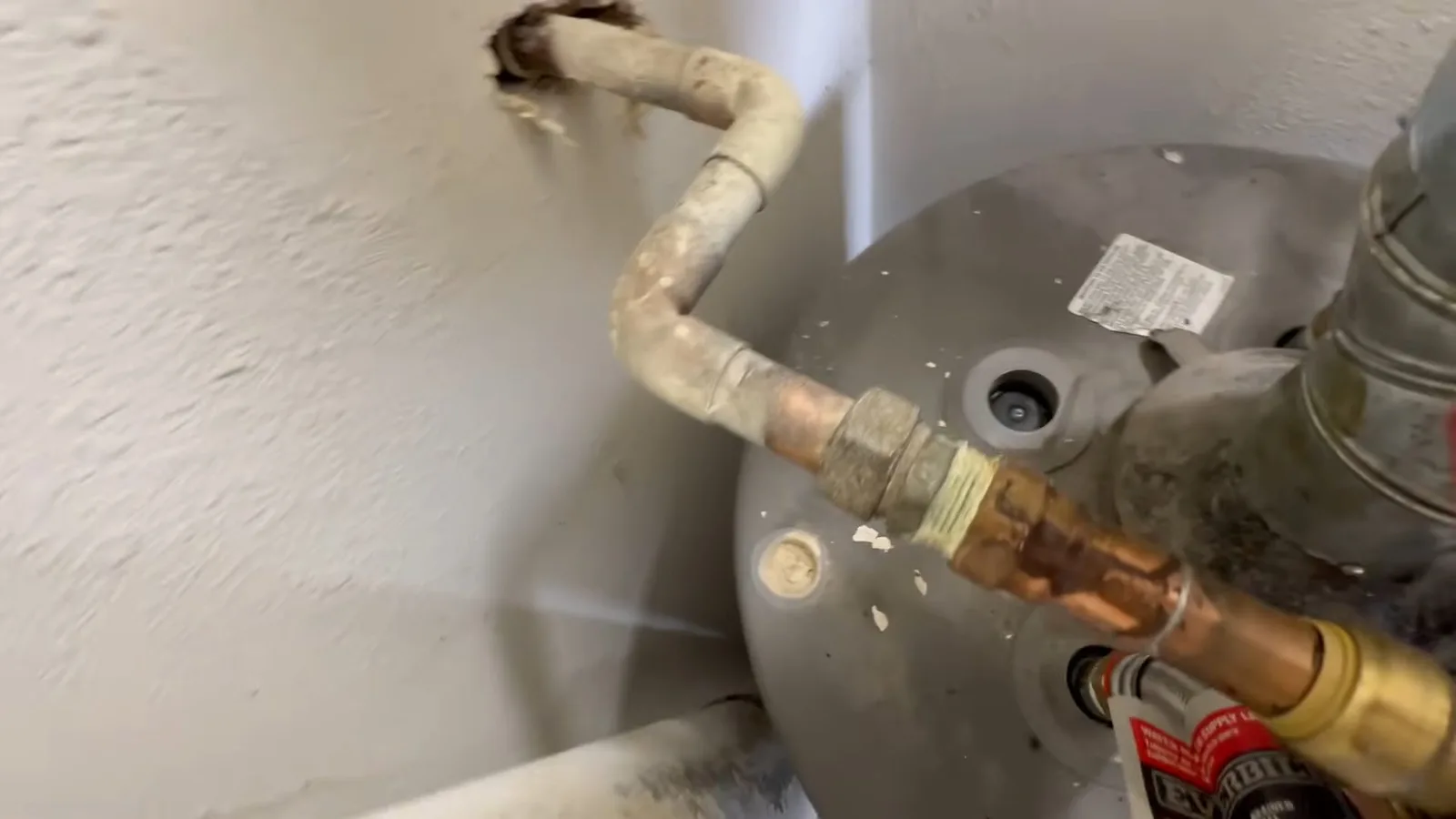 Anode rod wrench over water heater, captured on a water heater job near Chino Valley, AZ.