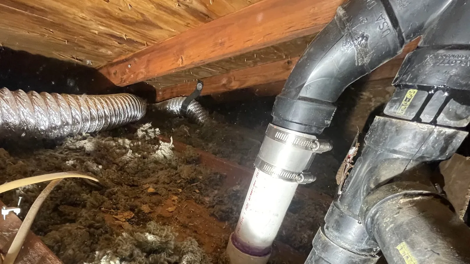 Basement drain vent pipe under floor, during a drain cleaning call in Chino Valley, AZ.