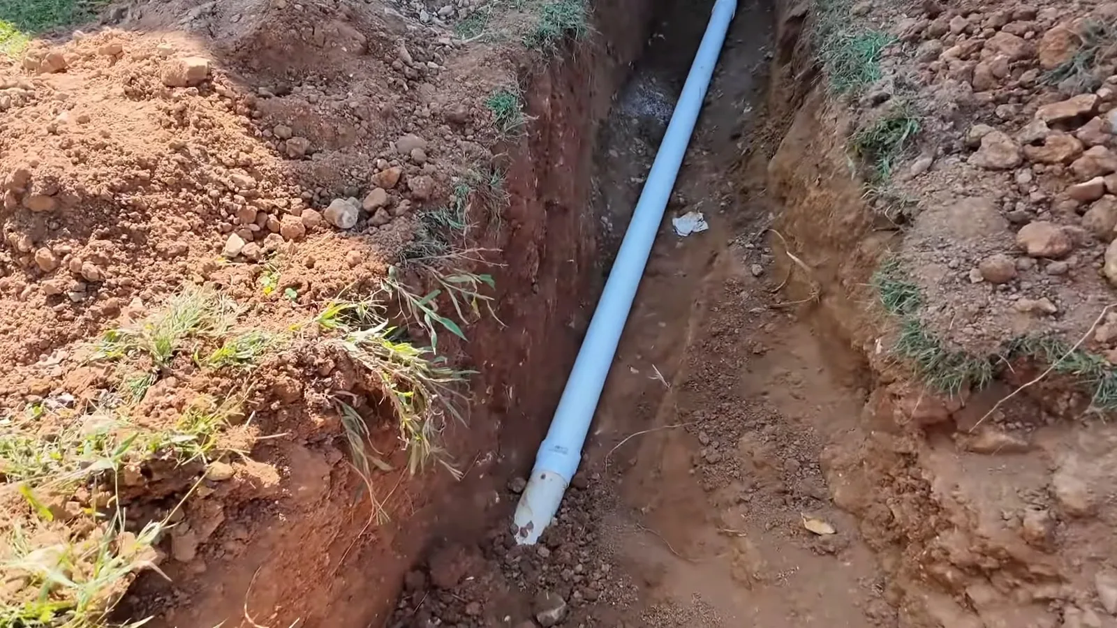 Buried replacement septic pipe in trench, captured on a sewer line job near Paulden, AZ.