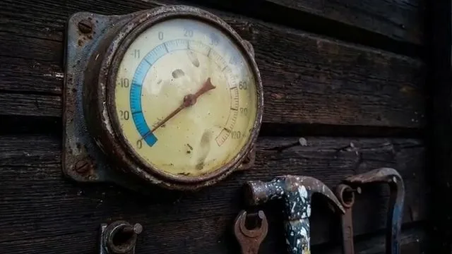 Close up temperature gauge on frozen line, captured on a frozen pipe job near Chino Valley, AZ.