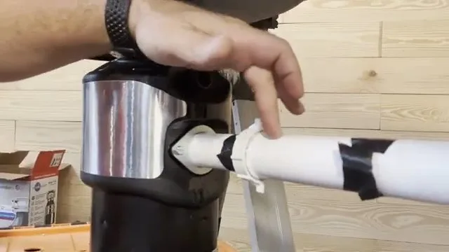 Connecting dishwasher hose to garbage disposal, during garbage disposal work for a Chino Valley, AZ property.