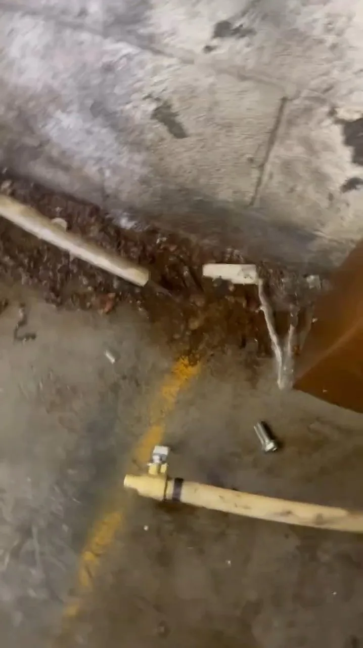 Copper pipe repair in shallow floor trench, captured on a sewer line job near Chino Valley, AZ.