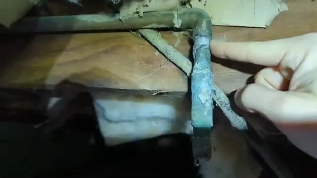 Corroded copper pipe in crawlspace, seen during repiping service in Williamson Valley, AZ.