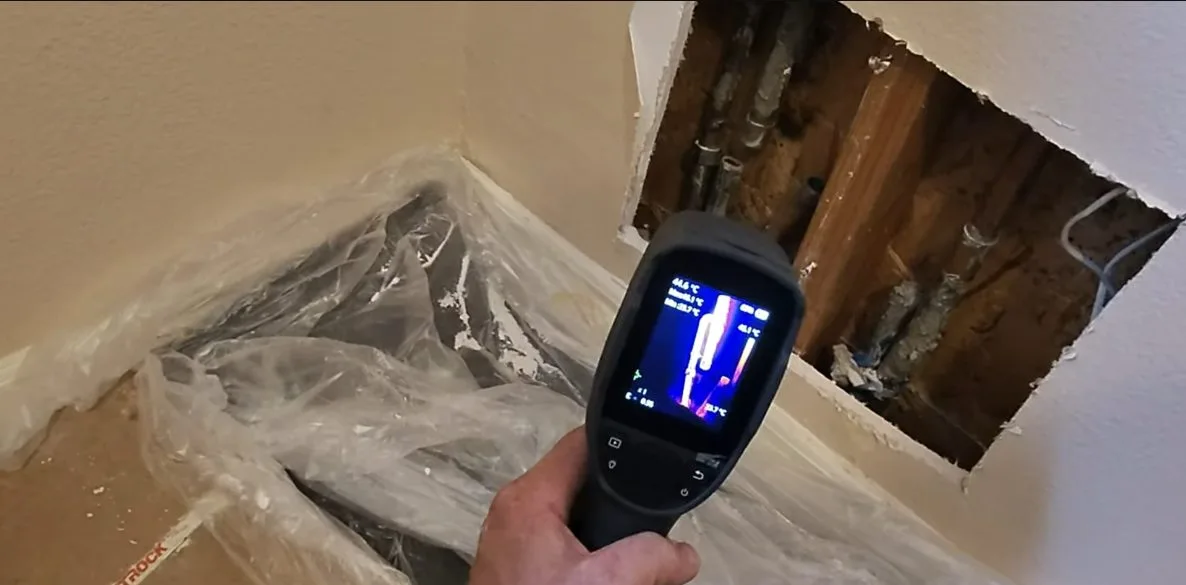 Digital leak detector screen over floor, seen during leak detection service in Chino Valley, AZ.