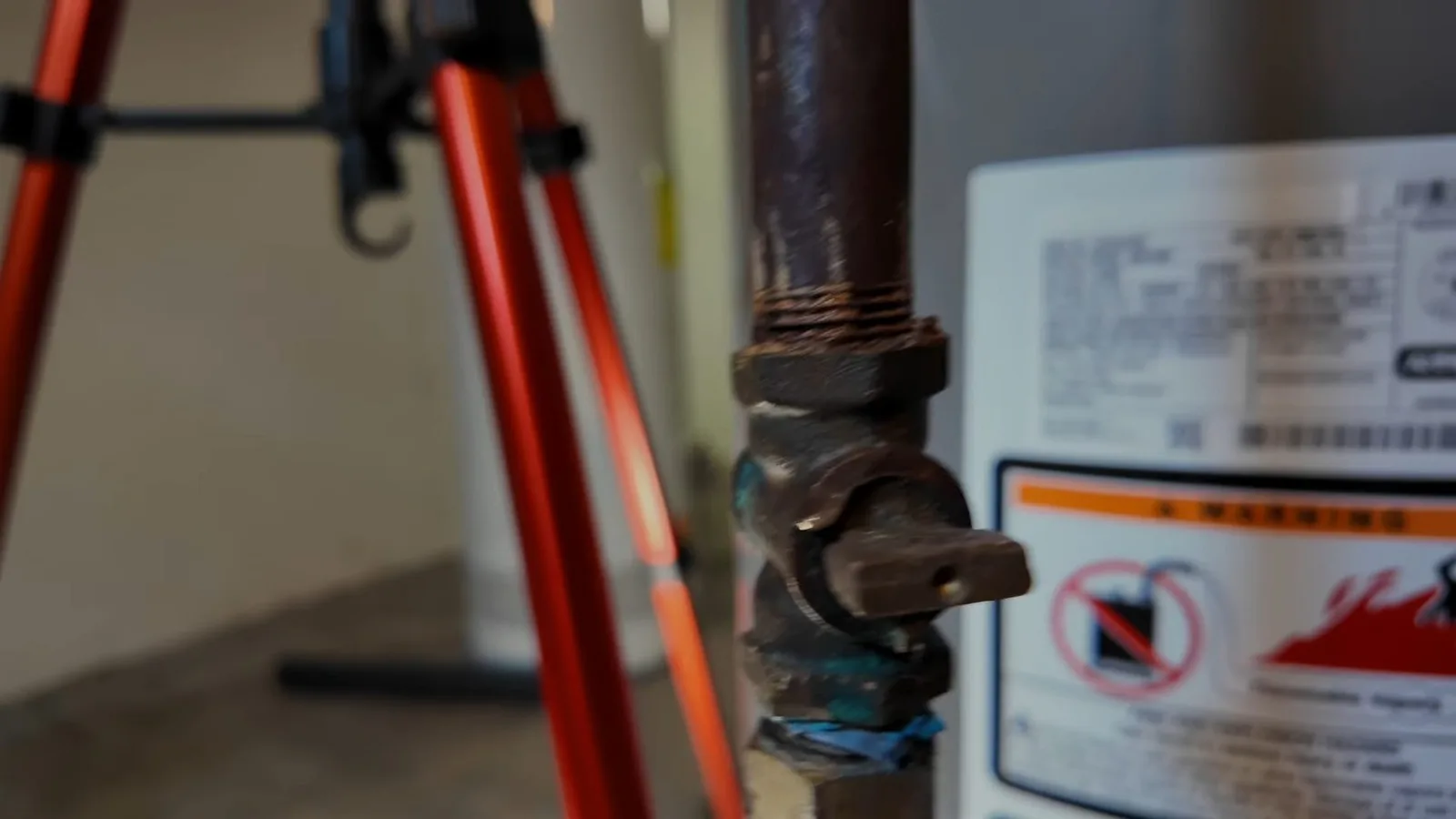 Gas shutoff valve beside water heater, during a gas line call in Chino Valley, AZ.