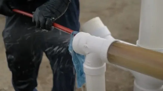 Inserting hydro jetting hose into pvc pipe, during hydro jetting work for a Chino Valley, AZ property.