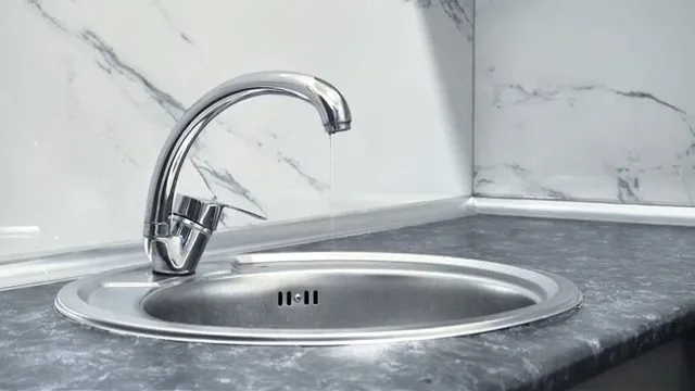 Kitchen faucet running after quick repair, photographed during faucet repair work in Chino Valley, AZ.