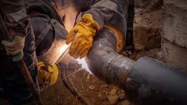 Measuring concrete slab plumbing run, captured on a slab leak job near Chino Valley, AZ.
