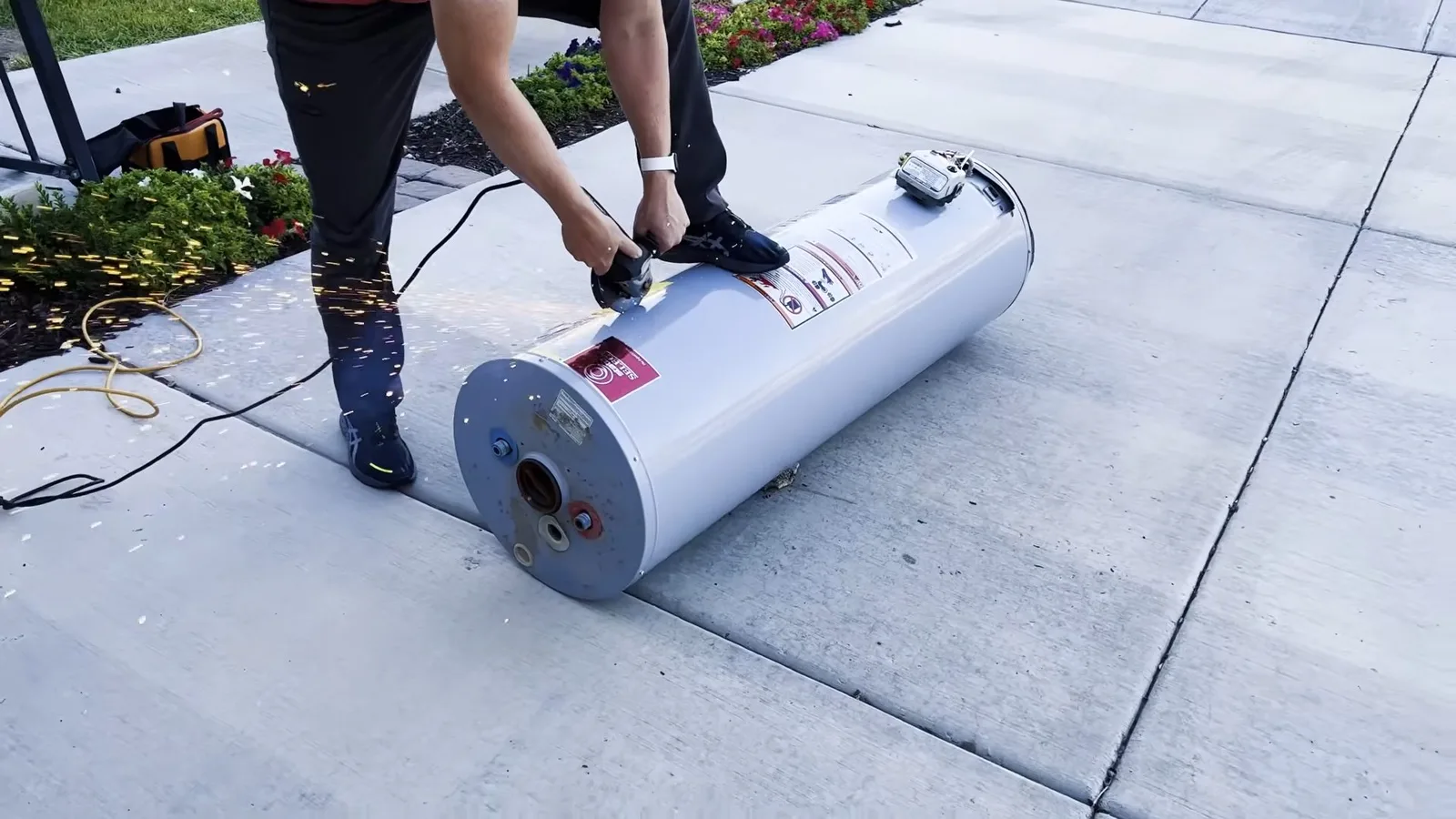 Moving water heater on hand truck, photographed during water heater work in Chino Valley, AZ.
