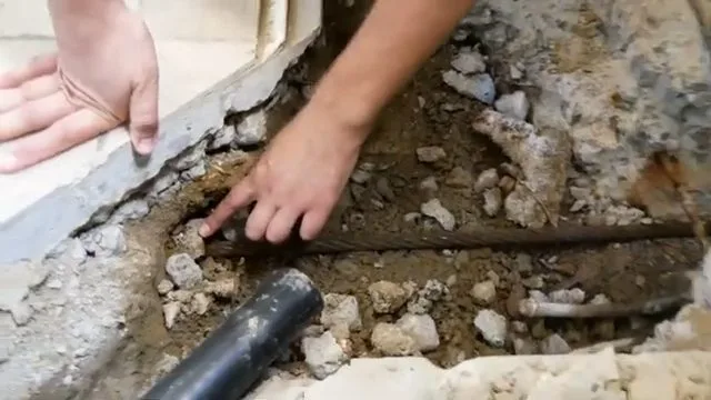 New sewer pipe running through foundation trench, photographed during sewer line work in Chino Valley, AZ.