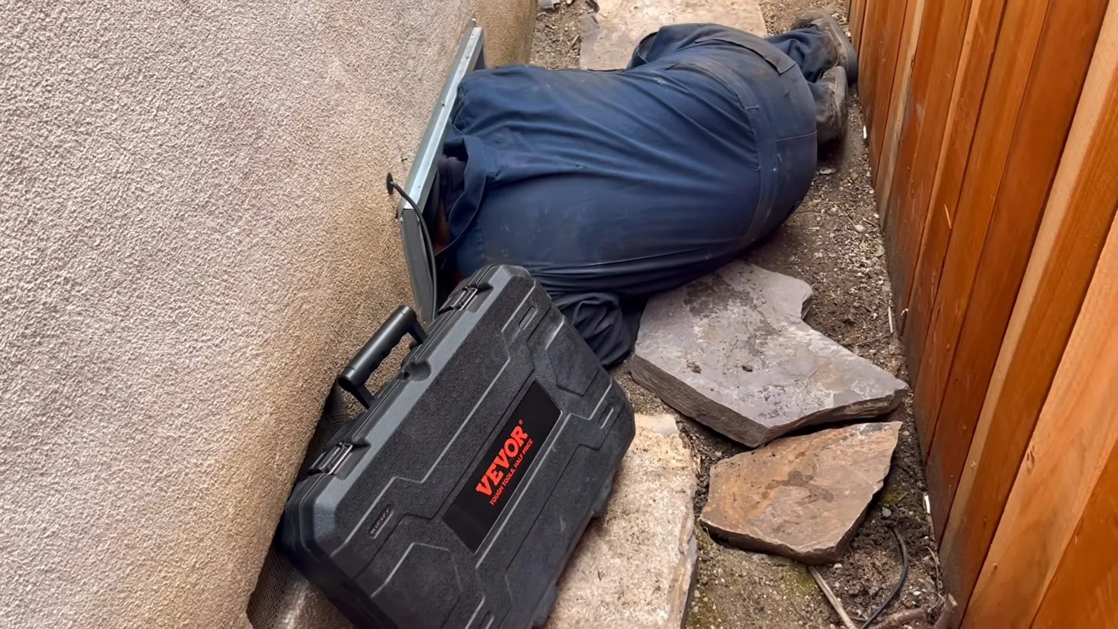 Plumber searching crawlspace for leak, photographed during crawlspace plumbing work in Chino Valley, AZ.