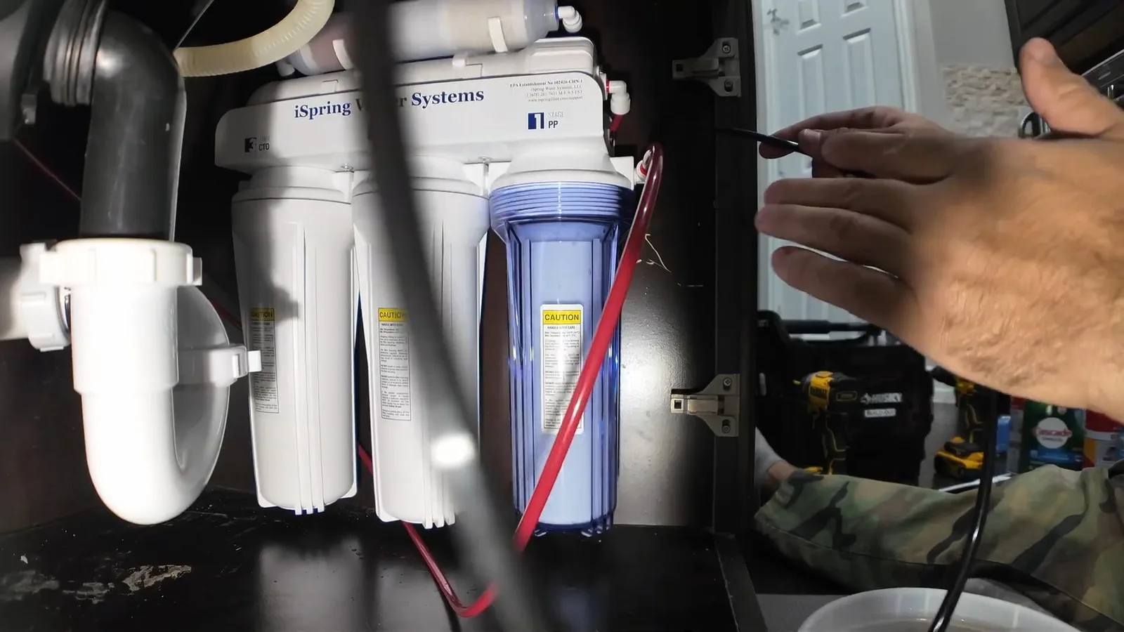 Reverse osmosis tubing beneath sink, captured on a water filtration job near Chino Valley, AZ.