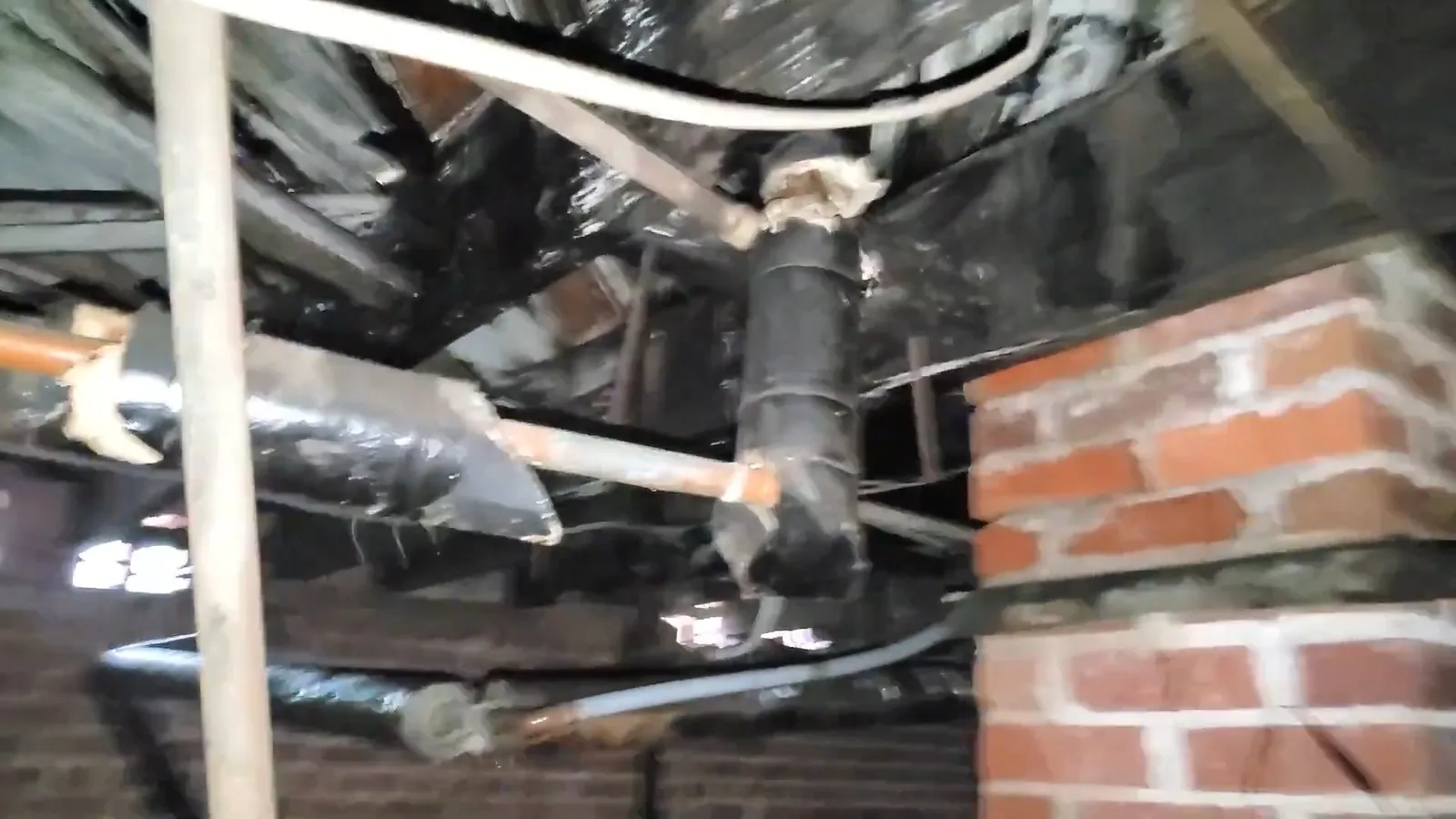 Rusty leaking crawlspace plumbing joint, during a crawlspace plumbing call in Williamson Valley, AZ.