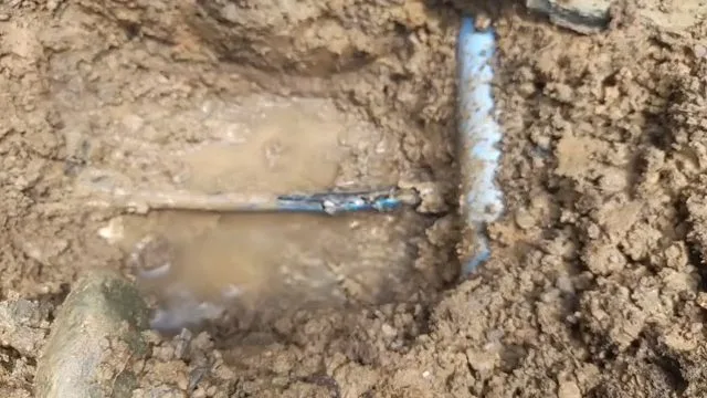 Searching for leak in flooded excavation, seen during water damage restoration service in Chino Valley, AZ.