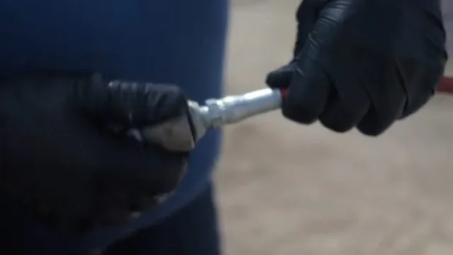 Selecting hydro jet nozzle from tool case, photographed during hydro jetting work in Chino Valley, AZ.