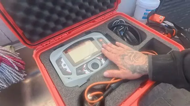 Setting up acoustic water leak detector, during leak detection work for a Chino Valley, AZ property.