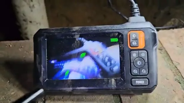 Sewer camera monitor showing pipe interior, seen during sewer camera inspection service in Chino Valley, AZ.