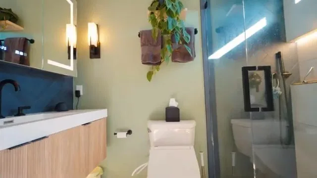Small bathroom after water damage renovation, captured on a water damage restoration job near Chino Valley, AZ.