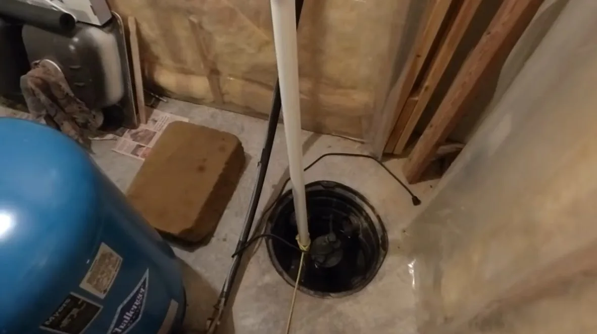 Sump pump basin before installation, during sump pump work for a Chino Valley, AZ property.