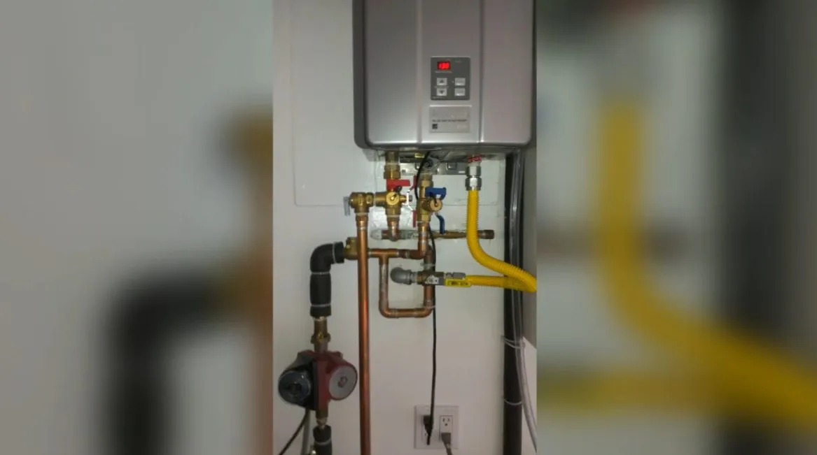 Tankless water heater valves and lines, during tankless water heater work for a Chino Valley, AZ property.