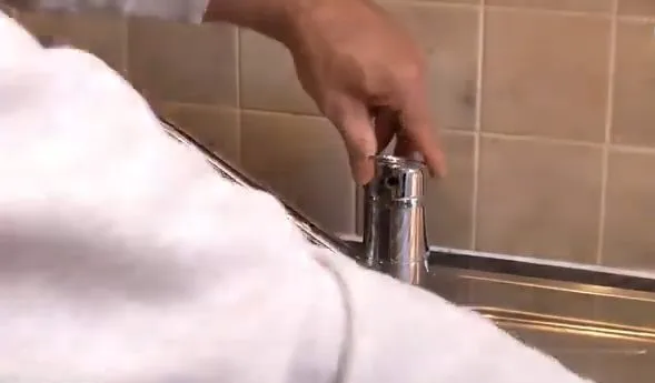Testing repaired single handle kitchen faucet, captured on a faucet repair job near Chino Valley, AZ.