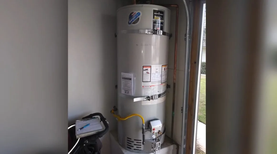 Water heater inside utility closet, during water heater work for a Chino Valley, AZ property.