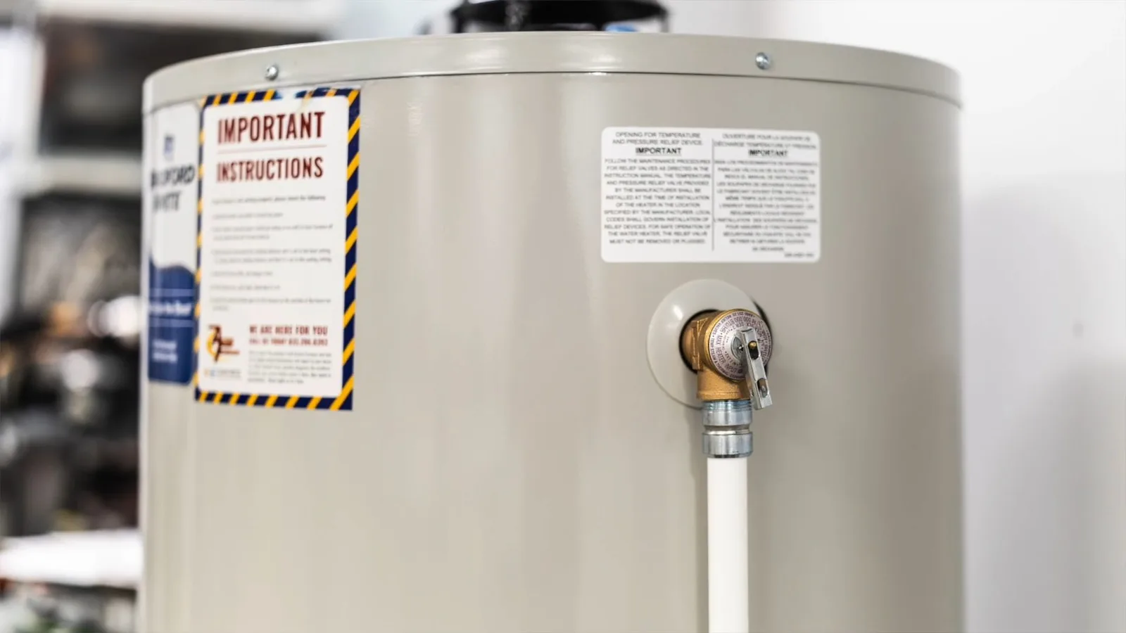 Water heater supply connection on tank, photographed during water heater work in Chino Valley, AZ.