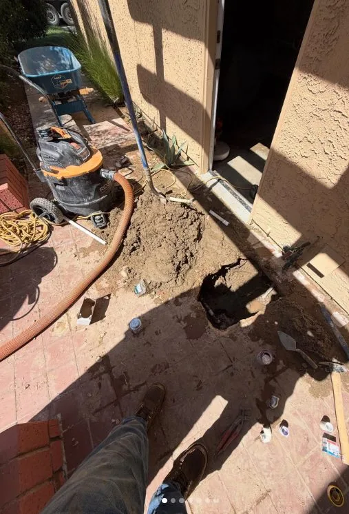 Worker saw cutting concrete slab, during slab leak work for a Chino Valley, AZ property.